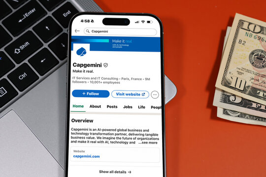 Kiel, Germany - 05-20-2026: Capgemini French consulting, technology services, and digital transformation company Profile on LinkedIn displayed in a workspace enviroment with laptop