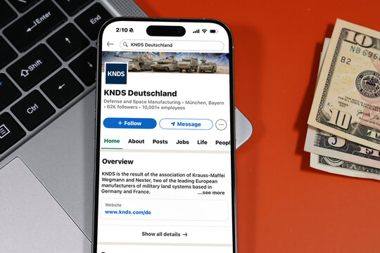 Kiel, Germany - 05-20-2026: KNDS Deutschland German defense and security technology company Profile on LinkedIn displayed in a workspace enviroment with laptop