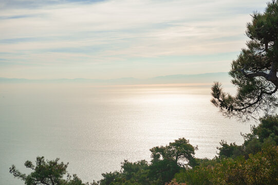 Calm blue sea horizon with distant ships
