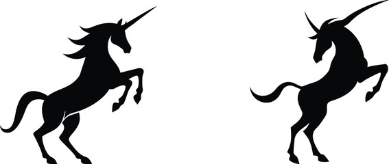 Rearing unicorn silhouette pair featuring magical horse with spiraled horn and flowing mane for fantasy fairytale theme. © meerobeul