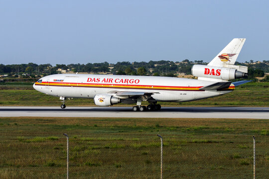 Luqa, Malta - June 23, 2007: DAS Air Cargo McDonnell Douglas DC-10-30CF (REG: 5X-JOE) departing runway 14 in the early morning.
