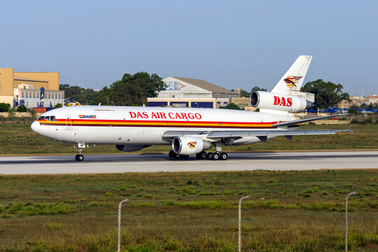 Luqa, Malta - June 23, 2007: DAS Air Cargo McDonnell Douglas DC-10-30CF (REG: 5X-JOE) departing runway 14 in the early morning.