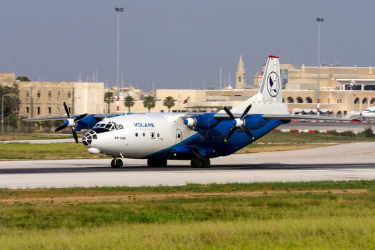 Luqa, Malta - June 22, 2007: Volare Aircompany Antonov An-12BK (REG: UR-SMA) backtracking runway 14 after landing on the inboard engines only.