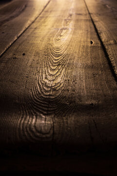 Old worn longleaf pine flooring in a cabin in North Carolina