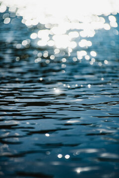 Closeup of blue sparkling water with shallow focus