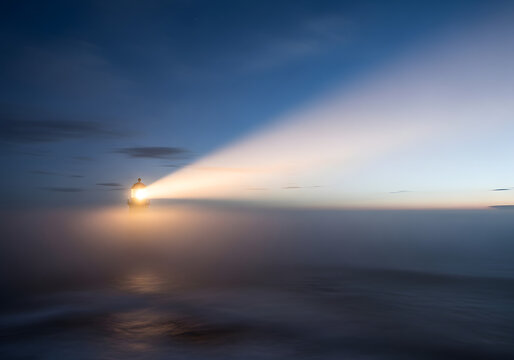 Cinematic blue hour view of a lighthouse beam cutting through fog over the ocean, isolated on transparent background.