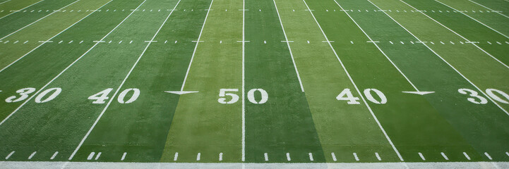 American football field marking with yard lines and numbers. © Ruba
