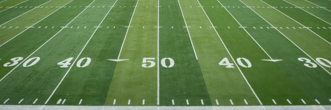 American football field marking with yard lines and numbers.