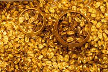 Piles of Traditional Chinese Gold Ingots and Golden Bowls © onlyyouqj