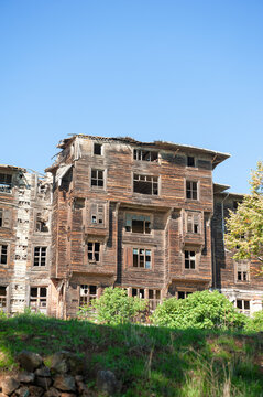 Abandoned wooden building with weathered facade showing decay and forgotten charm