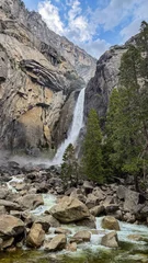 Fotobehang Yosemite Lower yosemite fall cascading down granite cliffs  © unai
