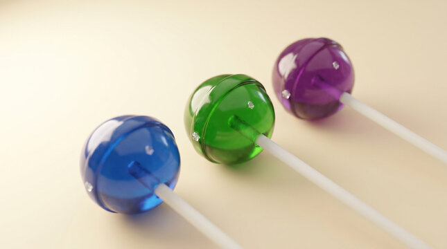 Three Jewel-Tone Lollipops (Blue, Green, Purple) on Beige Background
