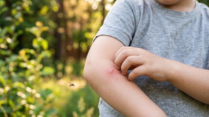 Obraz premium Child scratching a mosquito bite on the arm outdoors, representing itching, skin irritation, insect bites, summer health concerns, allergy symptoms and mosquito prevention