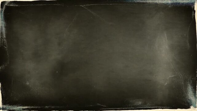 Static background video with dark textured surface. Features a rough, grungy, black and gray gradient. No motion or changes across frames.