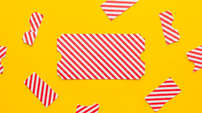 movie ticket yellow background cinema entertainment playful pop art composition striped admission ticket concept fits theater offers film festival passes streaming nights and entertainment promotions