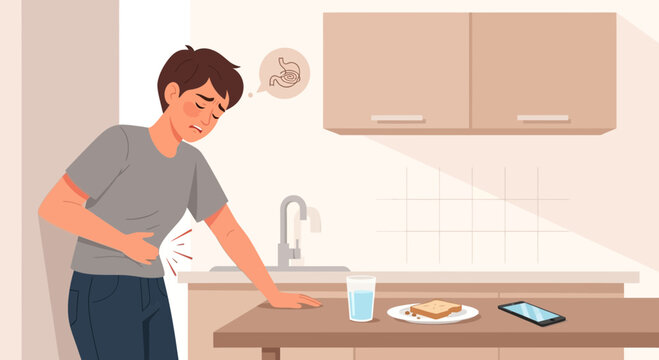 Man Experiencing Stomach Pain in Kitchen Illustrating Discomfort after Eating