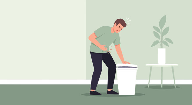 Man Experiencing Stomach Pain Next To Trash Can And Feeling Ill In Modern House