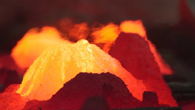 Molten Metal Solidification. Industrial Metal Pouring Revealing Crust Formation During Cooling Process . Stock clip