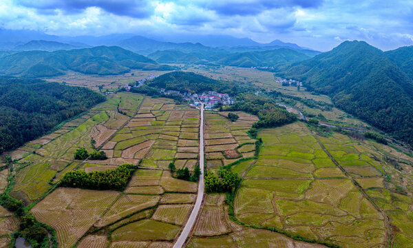 Aerial view of mountain valley farmland and village in Jiangxi China