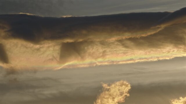 Iridescent Cloud at Sunset Over Antarctica