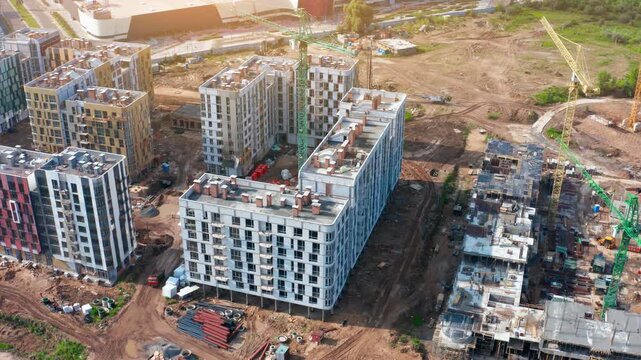 Urban construction project shows residential buildings under development in a growing city environment
