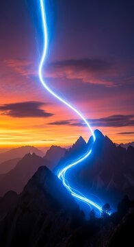 Vibrant blue light streaks across jagged mountain peaks at sunset