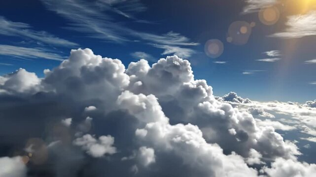 Epic cloudscape above white fluffy clouds with sunny light and a bright blue sky for relaxing and calm backgrounds