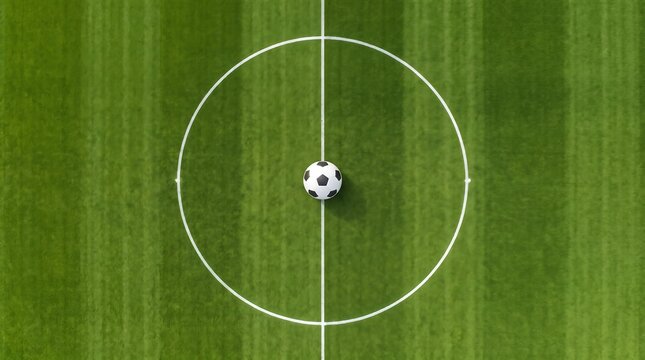 Minimalist top down aerial view of a classic leather soccer ball sitting exactly on the center circle white line of a lush green football field pitch.