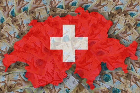 Switzerland. The flag of Switzerland in the form of a map of Switzerland against the background of a multitude of Swiss 200 CHF banknotes. The concept of business and economics in Switzerland.   
