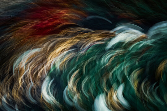 Abstract nature background with motion blur and colorful curved patterns.