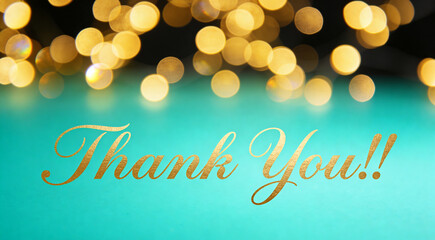 Naklejka premium Elegant Thank You Card with Gold Script and Bokeh Lights