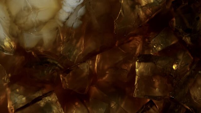 Macro Pour of Milk Into Ice Coffee With Cream Swirl , Super Slow Motion , Filmed on High Speed Cinematic Camera