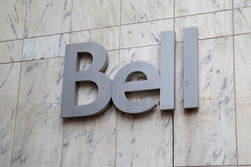 Naklejka premium Toronto, Ontario, Canada - October 22, 2017: Closeup Bell sign on Bell Telephone Building in Toronto, Ontario, Canada. Bell is Canada's largest telecommunications company.