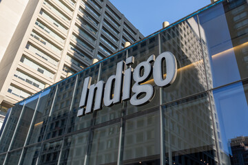 Fototapeta premium ToToronto, Canada - November 26, 2019: Indigo book store sign on the building in downtown Toronto; Indigo is the Canada's largest book, gift and specialty toy retailer.