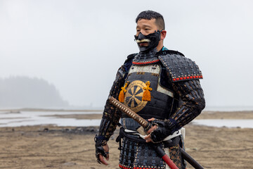 Obraz premium Samurai Warrior in Traditional Armor at Stave Lake, Mission, British Columbia, Canada, Coastal Landscape