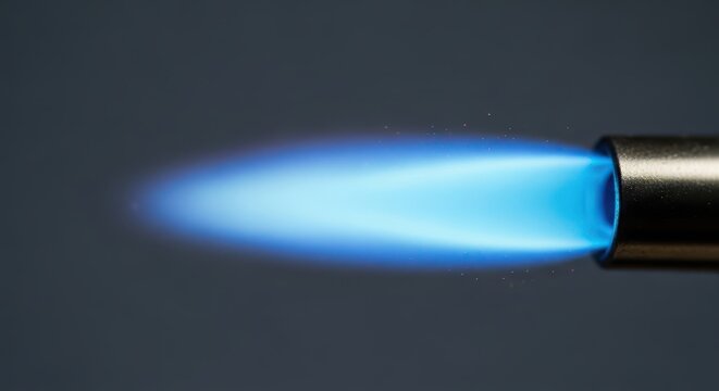 Detailed macro shot highlighting the intense concentrated blue jet flame produced by a modern, durable, and essential heating tool, safety, modern, precise