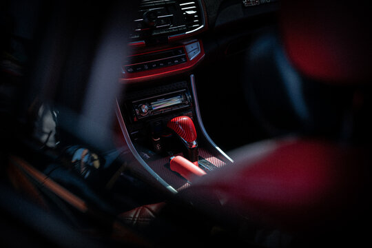 close up of red carbon fiber gear shift knob