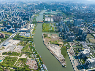 Beijing-Hangzhou Grand Canal through modern urban district in China © TrieuBao