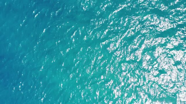 Cinematic Birds eye aerial drone footage of the stunning blue waters of Pangong Lake (Pangong Tso) in Ladakh, India.