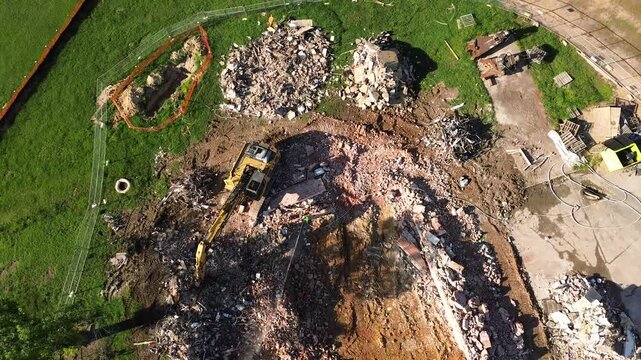 Aerial view of building demolition on Dix Park in Raleigh, North Carolina as part of the on-going park enhancement project