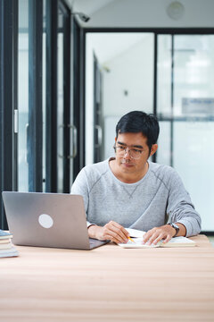 Student Studying Notes For Online Learning And Academic Coursework