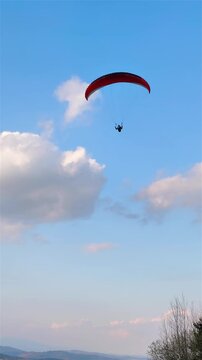 Paraglider Flying High Against Blue Sky, Freedom Adrenaline Adventure