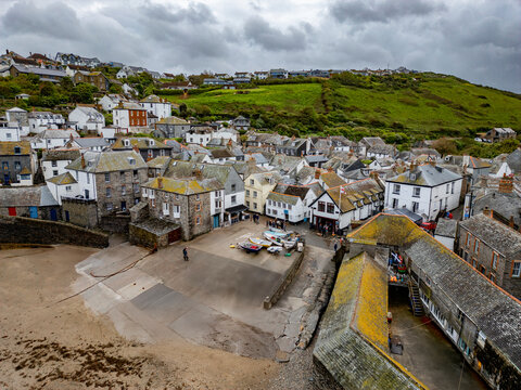 Aerial views of the coastal village of Port Isaac on the north coast of Cornwall, England