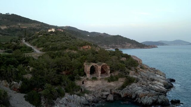 The scenic views of Aytap (iotape) is popular for camping, swimming in the natural caves, the local beaches, and the ancient ruins, located east of Alanya, in the Mediterranean Region, Turkey. 
