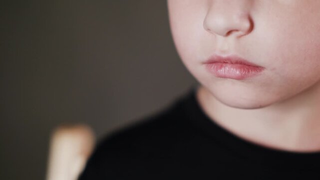 Emotional face of a boy, expression of different emotions
