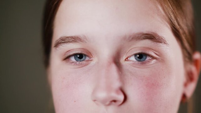 Emotional face of a girl, expression of different emotions