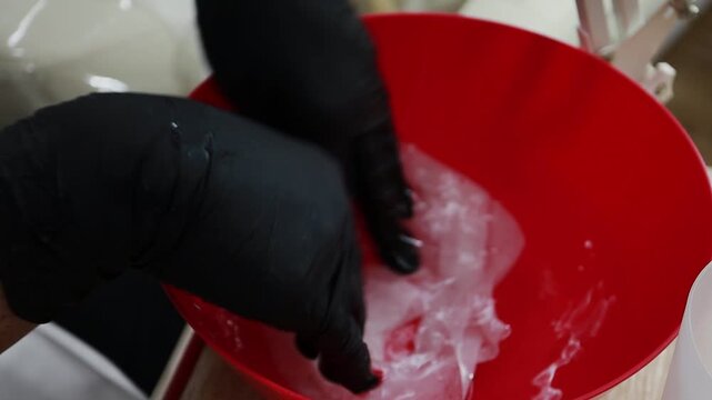 A female doctor, a professional cosmetologist, wets wipes