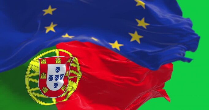 Close-up of Portugal and the European Union flags waving isolated on green background. Seamless 3D render animation. Chroma key. Slow motion loop. Green screen. 4K. Selective focus