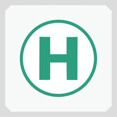 Fototapeta premium Green 'H' symbol in a circle