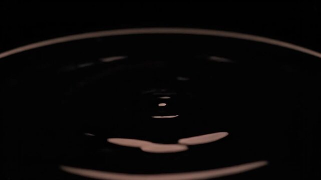 Mesmerizing water drop collision creating intricate splash patterns in slow motion